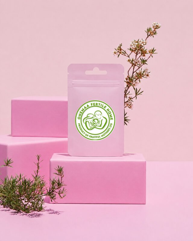 Pink fertility product pouch on pastel display blocks
